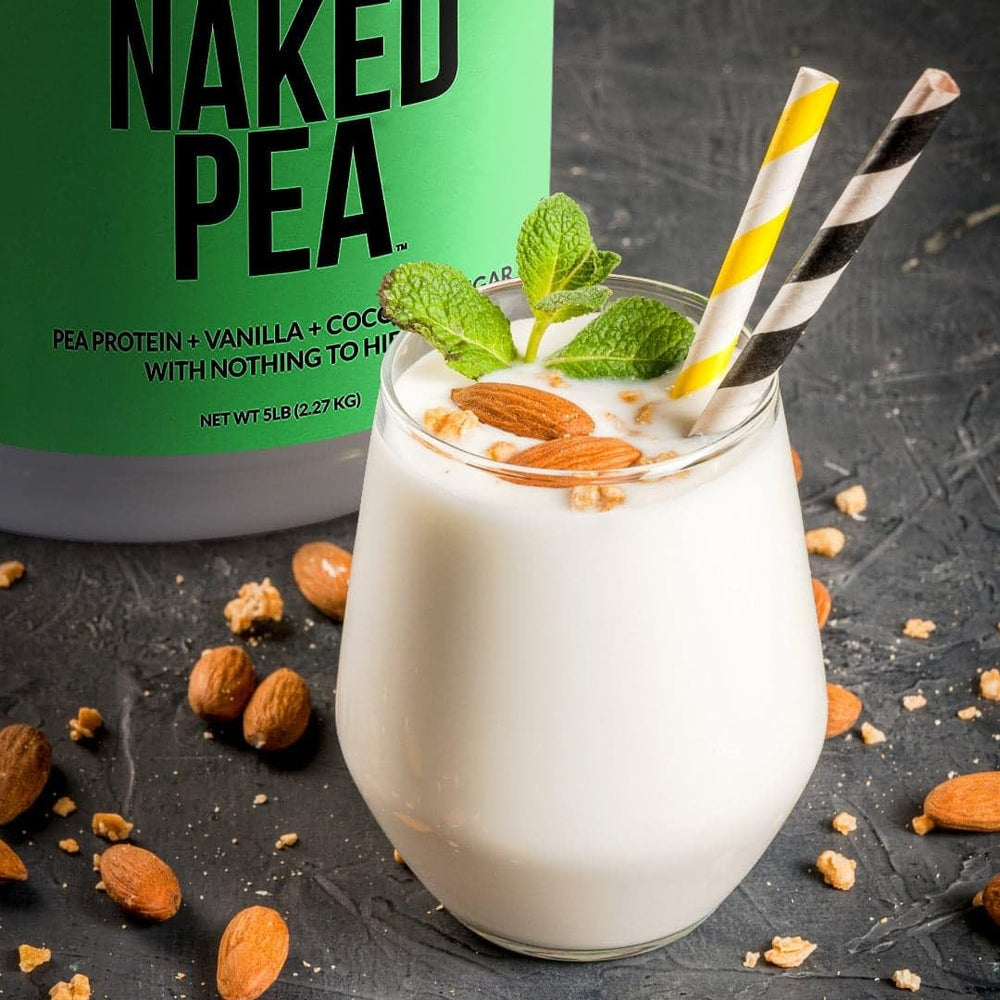 NAKED Vanilla Pea Protein ingredients closeup highlights yellow pea, vanilla, organic coconut sugar