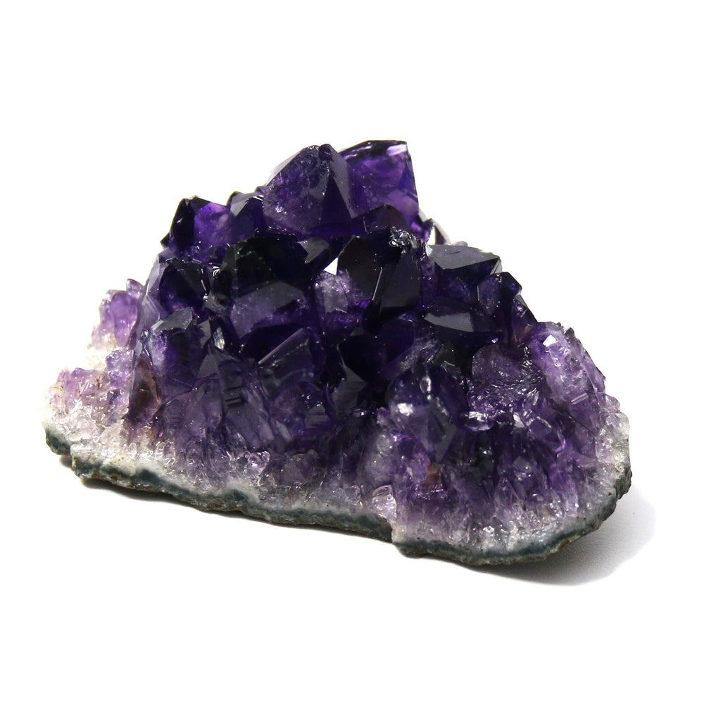 Namzi raw amethyst stones cluster on natural base, perfect for display and ambiance.
