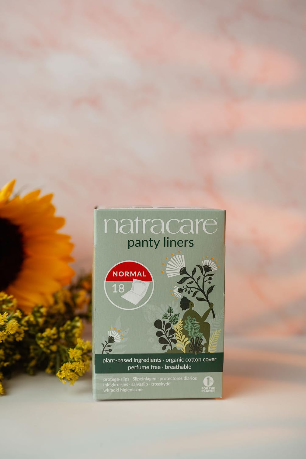 Close-up of Natracare breathable normal panty liner texture and softness