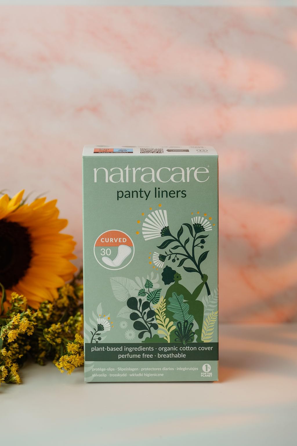 Natracare curved panty liners with organic cotton cover for skin comfort and breathability.