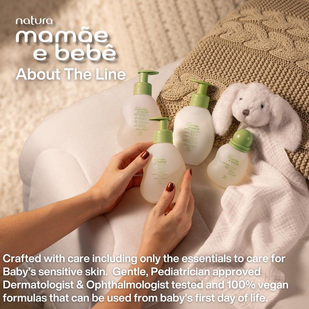 Natura Baby Massage Oil being poured into palm suggests easy, ready-to-use massage.