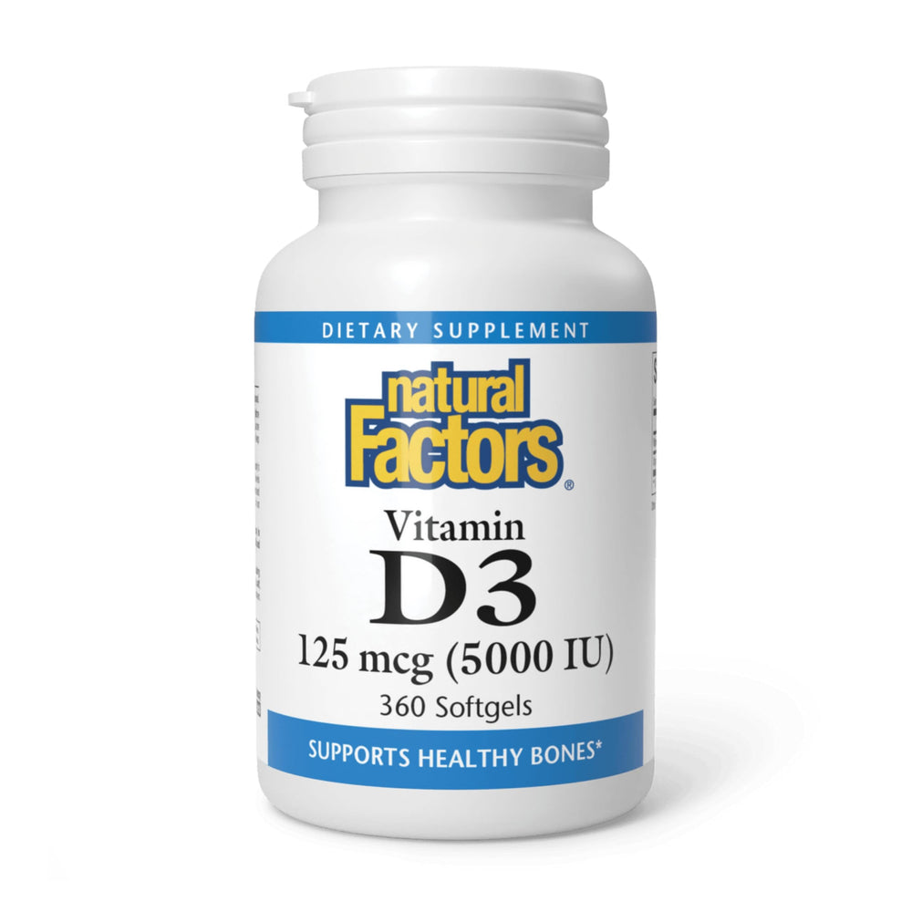 Natural Factors Vitamin D3 bottle on desk showing 360 softgels for daily immune and bone support.