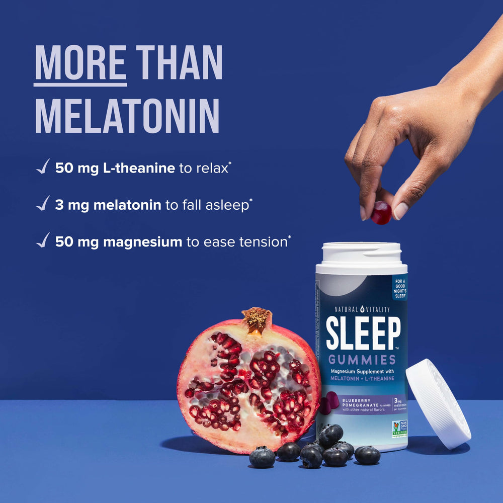 Serving spoon with two Natural Vitality SLEEP Gummies ready for bedtime.