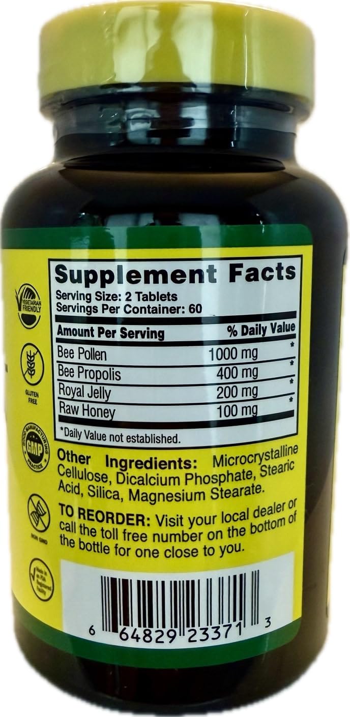 Nature Cure Bee Caps tablet close-up showing new size and color for easy daily dosing.