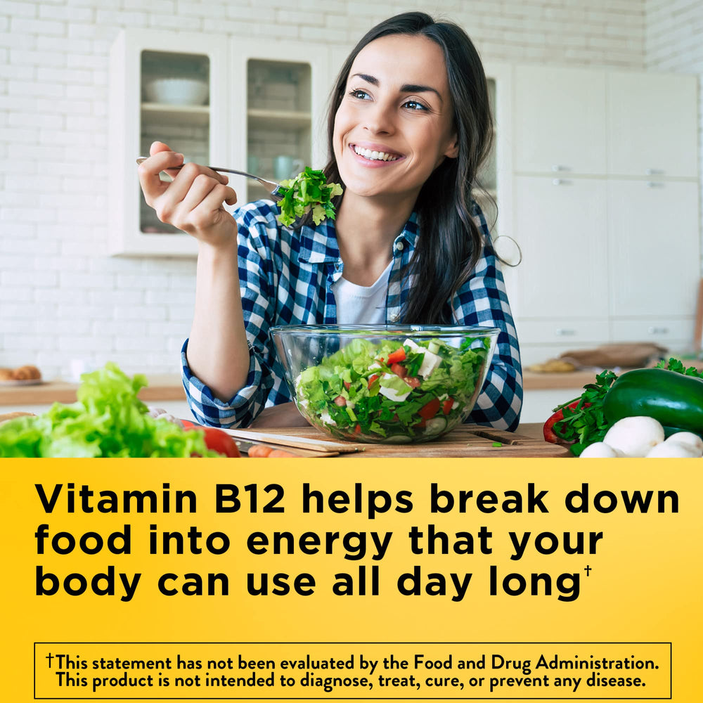 Close-up of Nature Made B12 softgel capsules for energy metabolism.