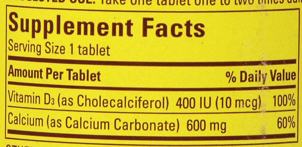 Pack of three Nature Made Calcium 600 mg with Vitamin D3 bottles on shelf.