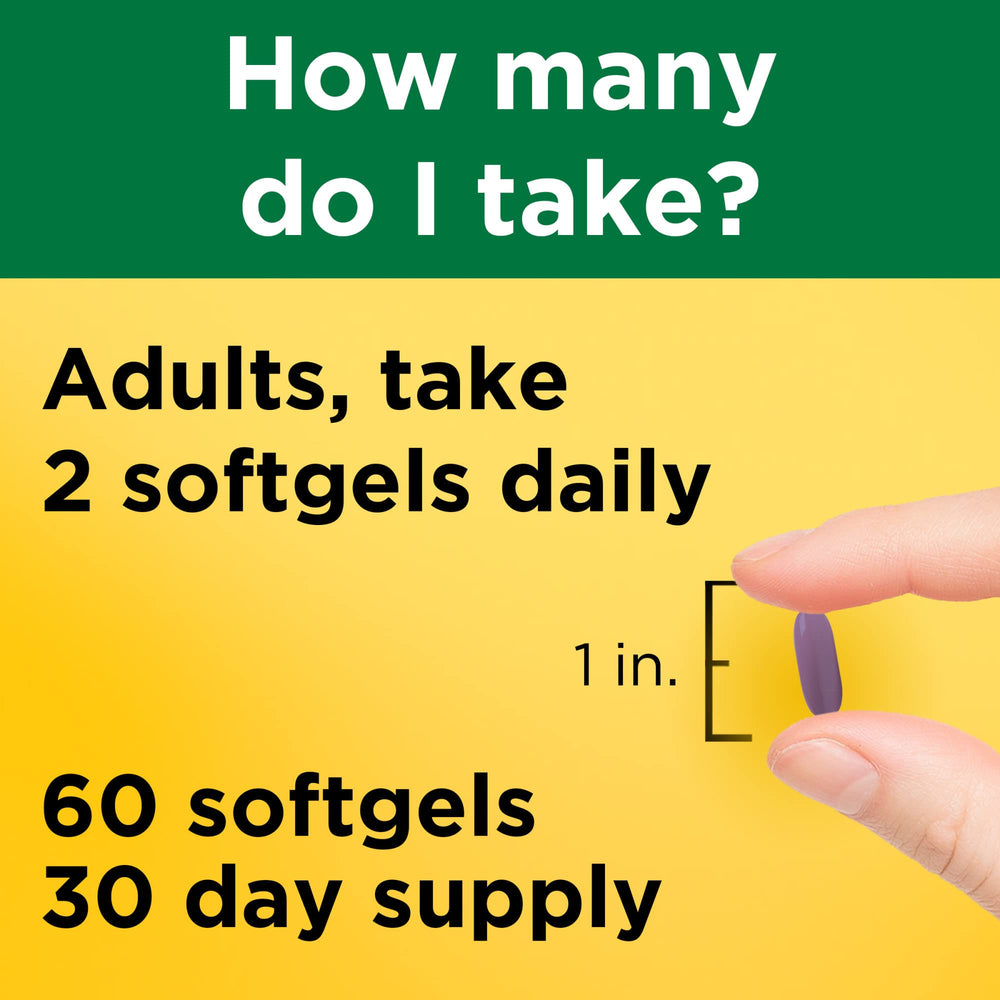 Nature Made magnesium citrate bottle with glass of water, suggesting daily intake.
