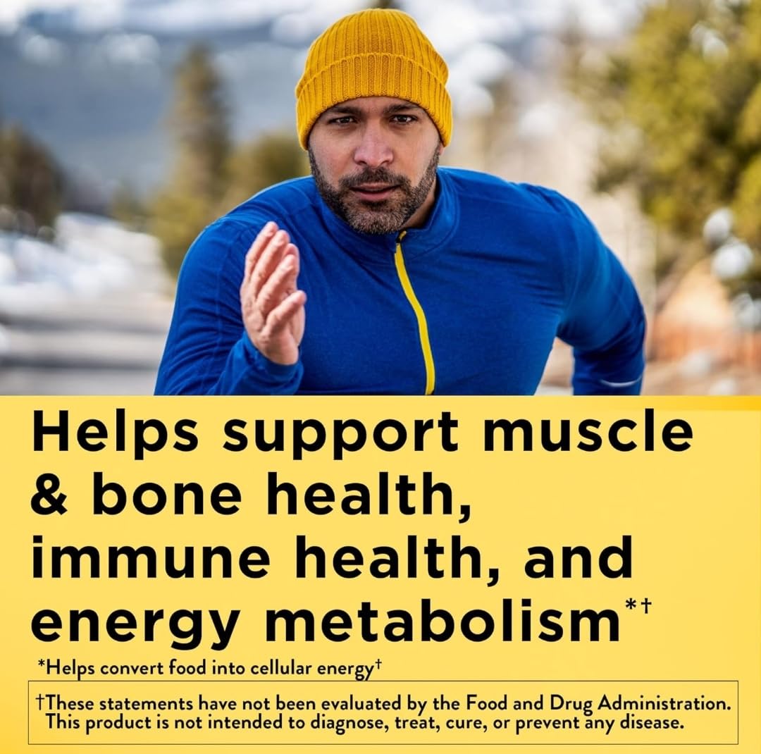 Nature Made Multivitamin for Him tablets close-up, iron-free formula for heart health
