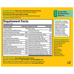 Nature Made multivitamin with water and meal demonstrates simple daily intake.