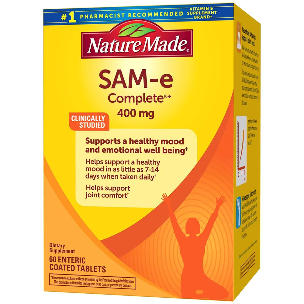 Nature Made SAM-e Complete 400 mg tablets close-up shows enteric-coated texture for gentle digestion.