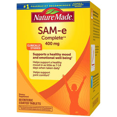 Nature Made SAM-e Complete 400 mg tablets close-up shows enteric-coated texture for gentle digestion.
