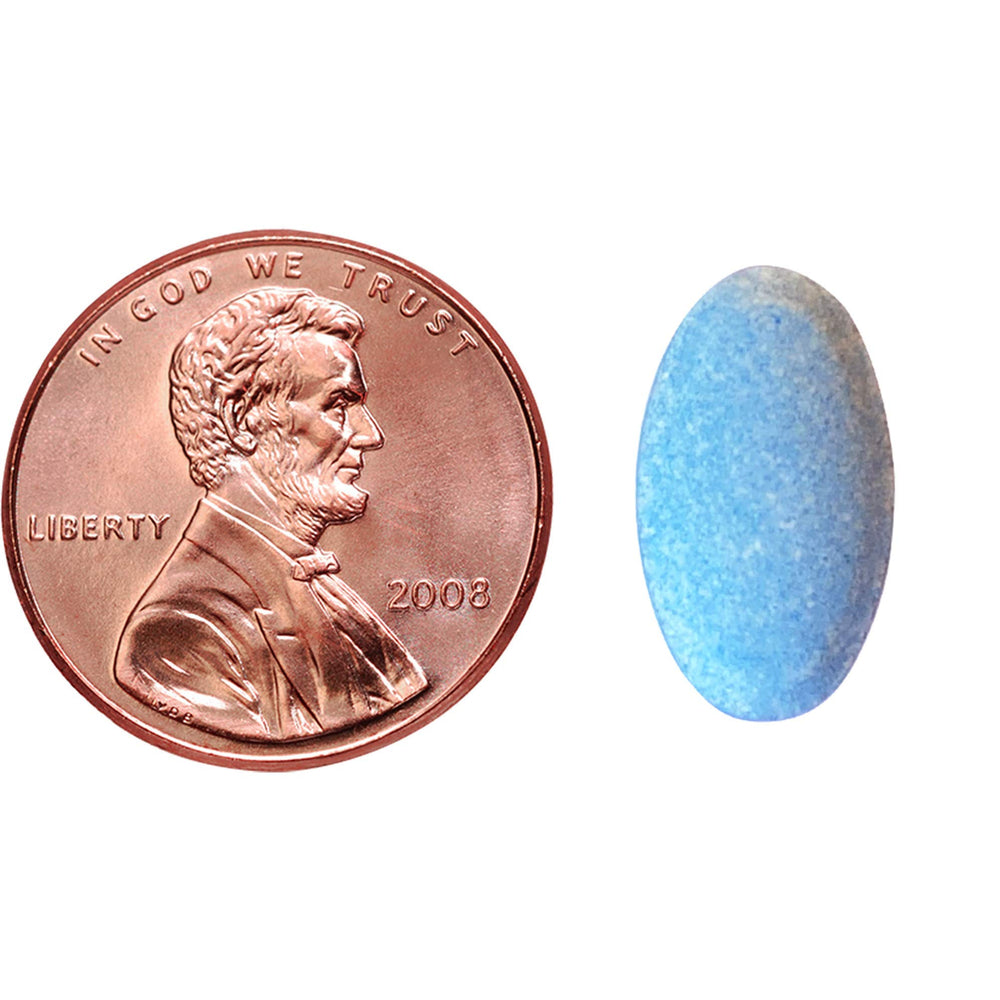 Nature Made Sleep Longer tablets closeup shows tri-layer melatonin formula