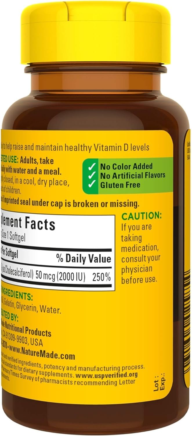 Nature Made Vitamin D3 in hand shows capsule size and portability.