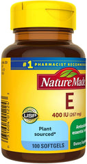 Close-up of Nature Made vitamin E 400 IU softgels bottle label highlighting plant-sourced formula