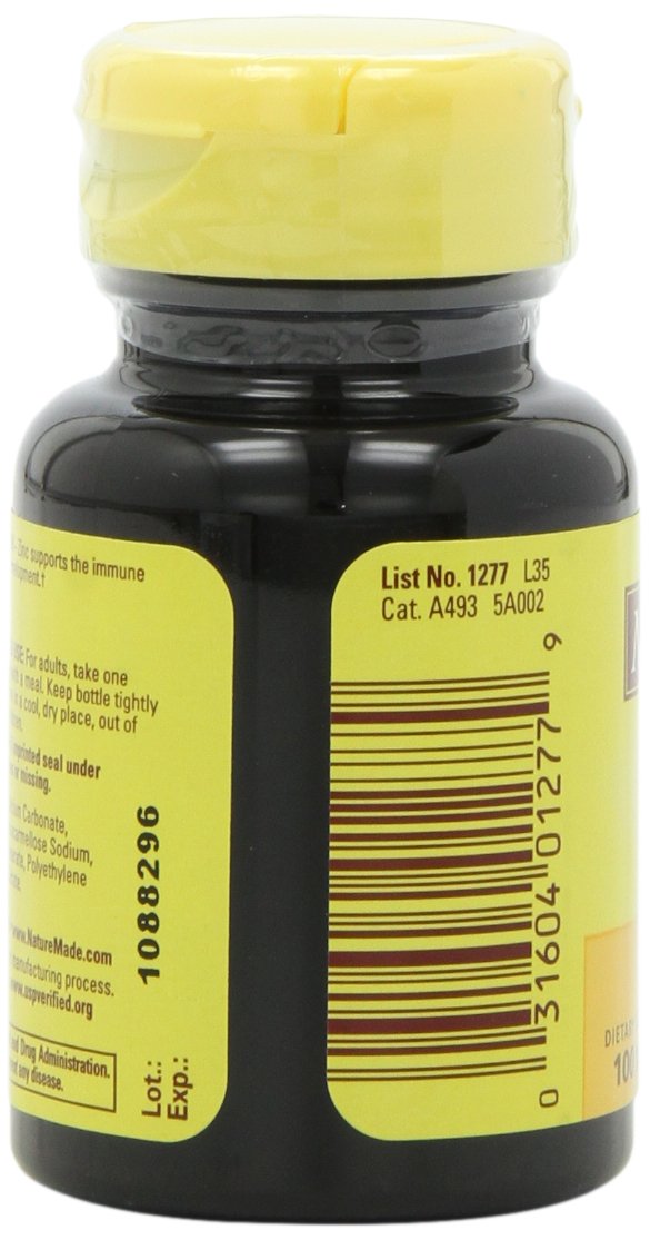 Zinc 30mg packaging in natural light on kitchen counter.