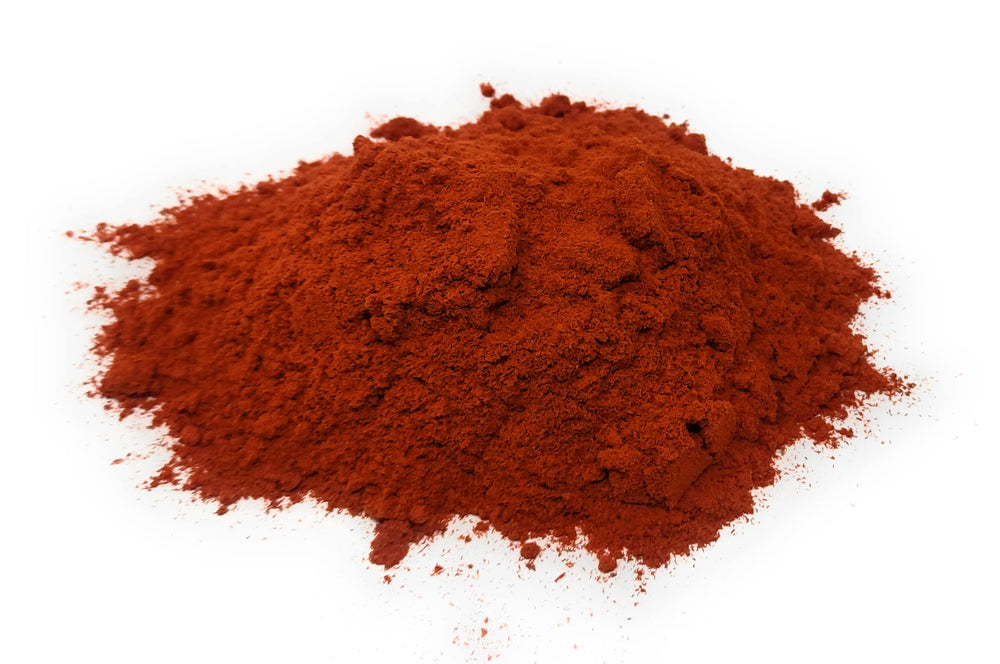 Naturegrail Pure Sandalwood Powder spooned into hot water for tea