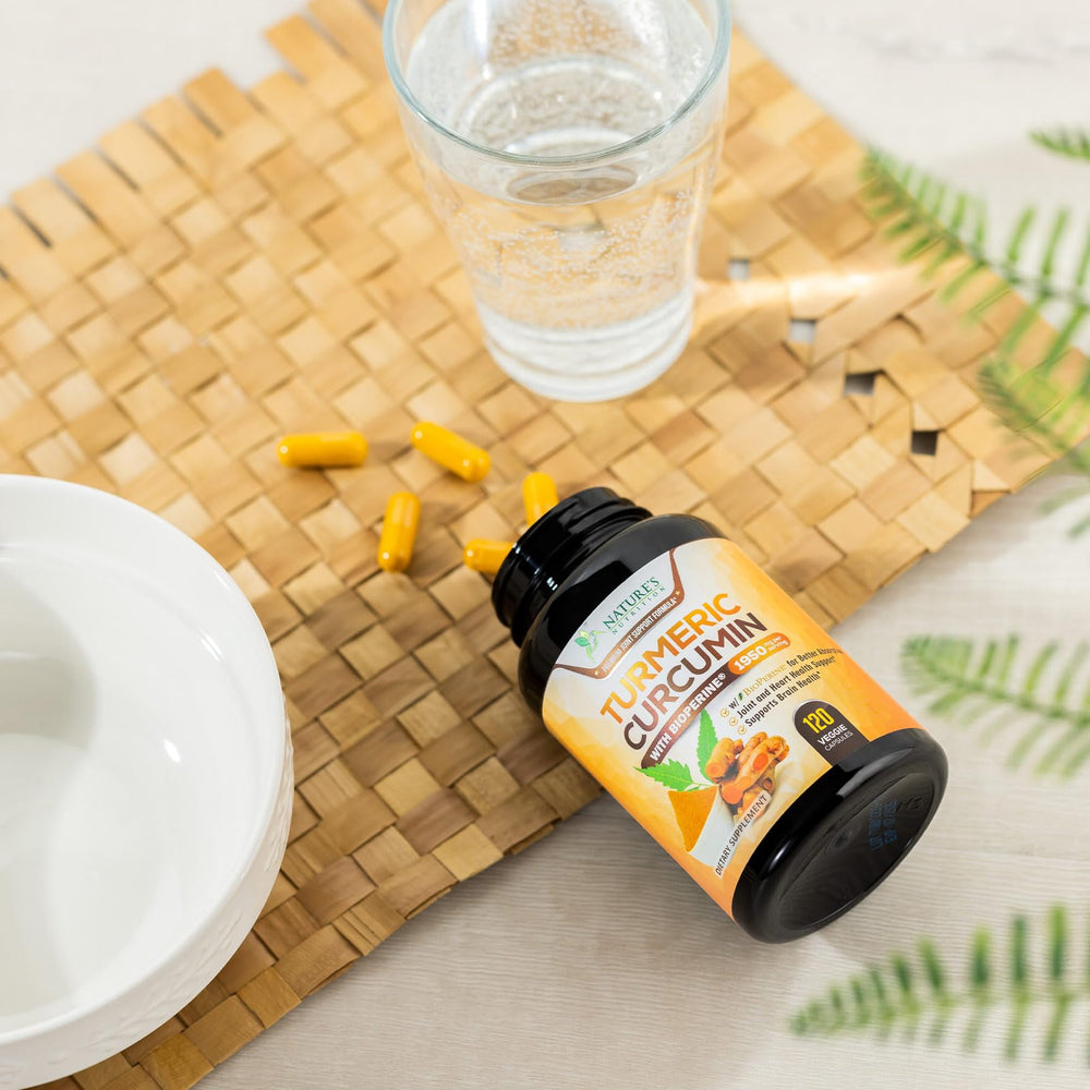 Hands holding Nature's Nutrition capsules ready for daily routine