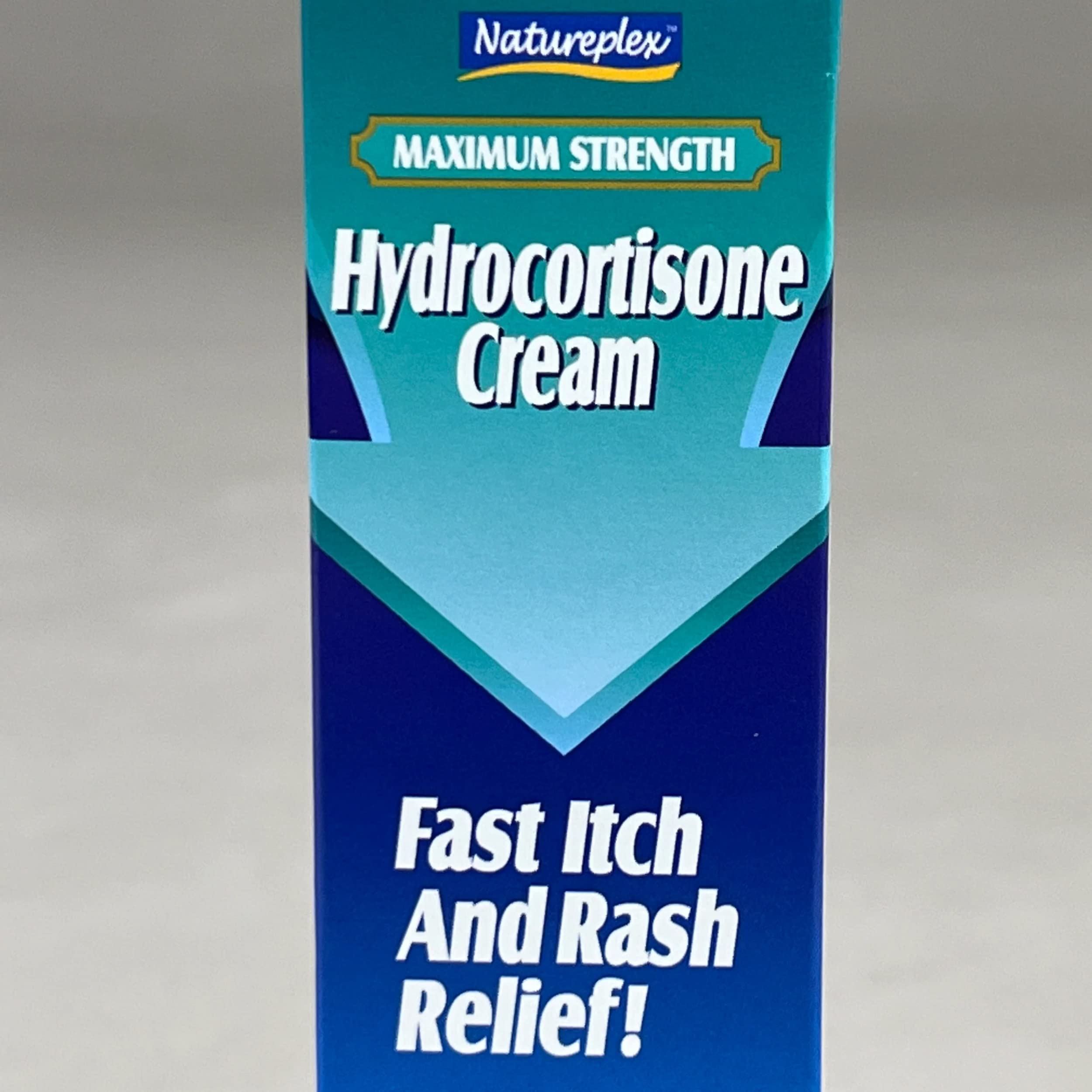 Natureplex Hydrocortisone Cream 1% tube close-up shows label and texture.