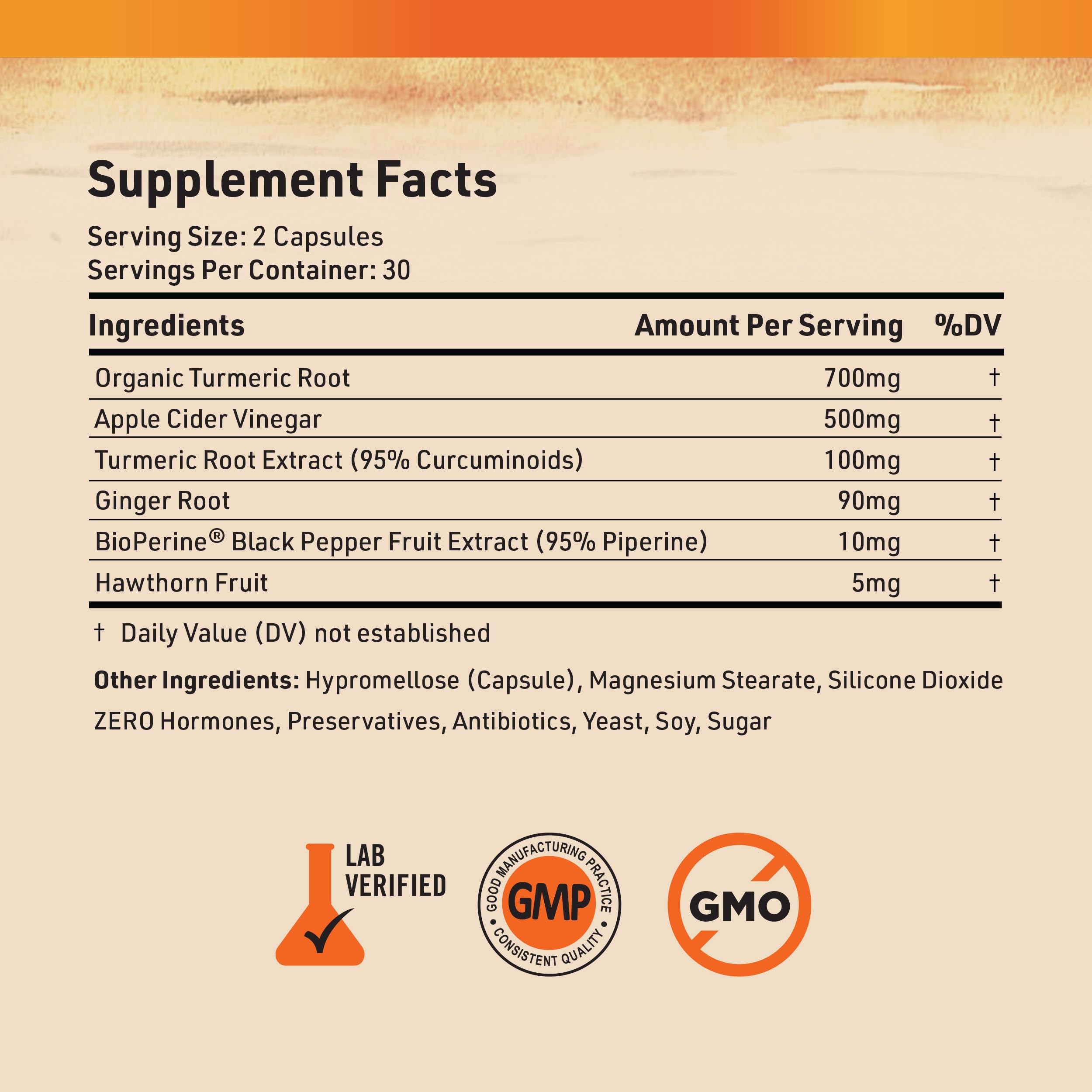 Nature's Base turmeric bottle beside a spoonful of ACV powder