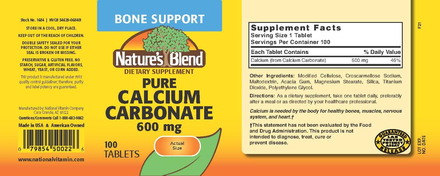 Nature's Blend calcium carbonate tablet close-up highlighting tablet shape and dosage.