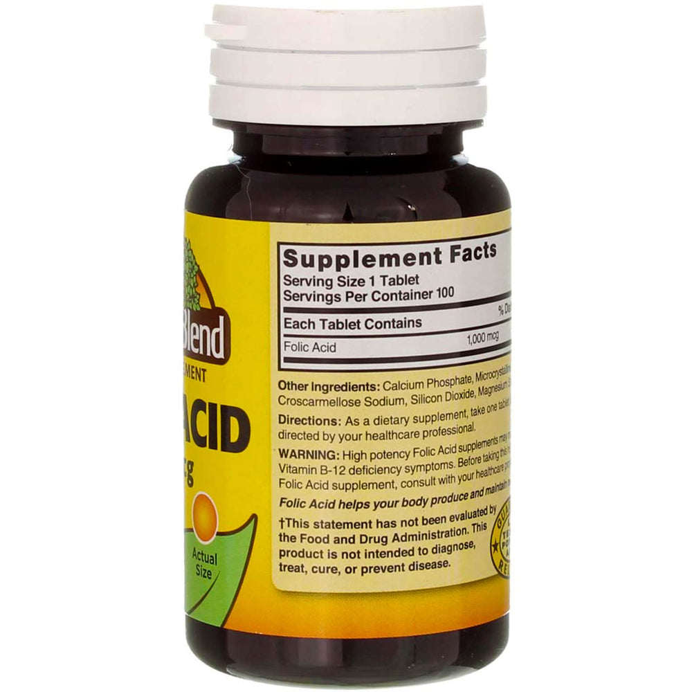Nature's Blend folic acid tablets in hand, ready for daily wellness routine.