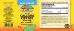 Nature's Blend blueberry liquid calcium citrate being poured for convenient daily use