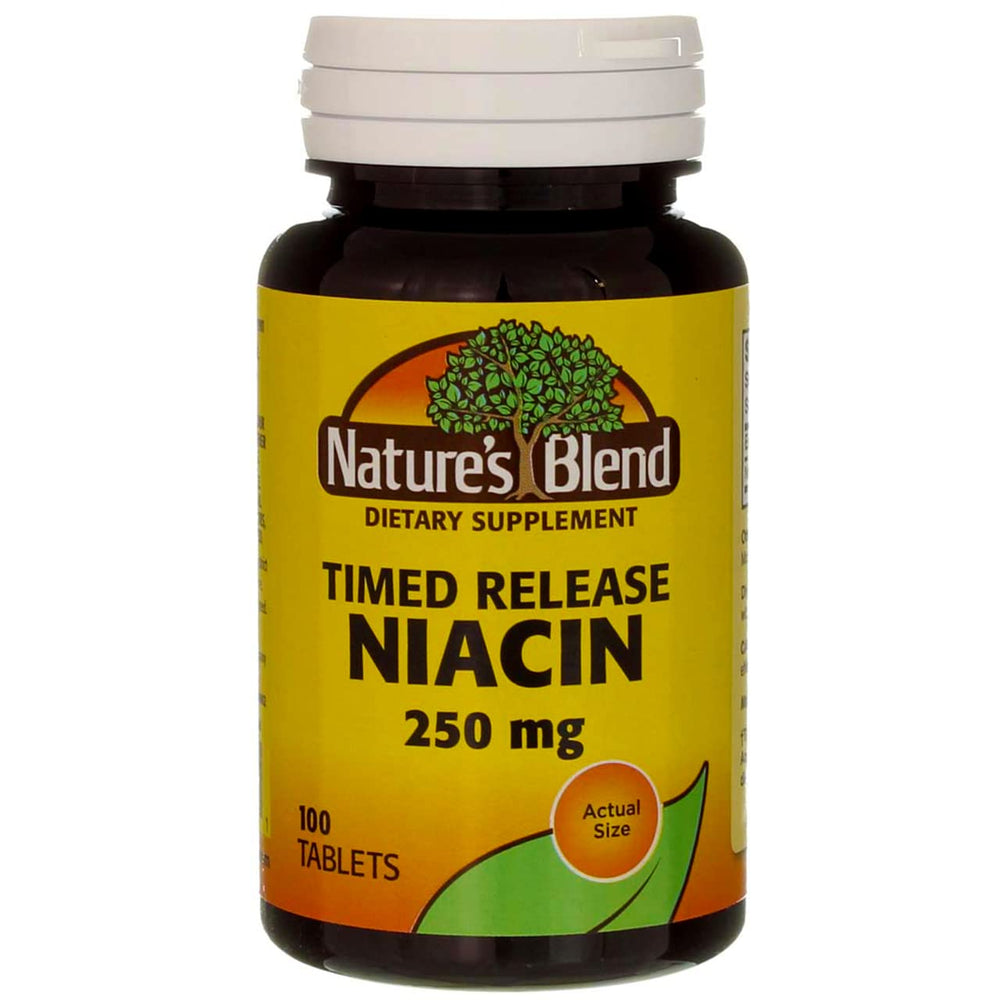 Close-up of Nature's Blend Niacin Timed Release tablet highlighting dosage