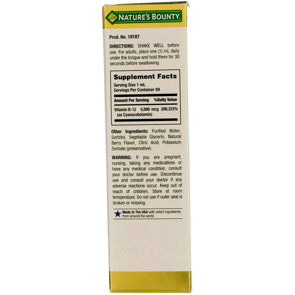 Nature's Bounty B-12 berry-flavored liquid bottle close-up highlighting no artificial colors.