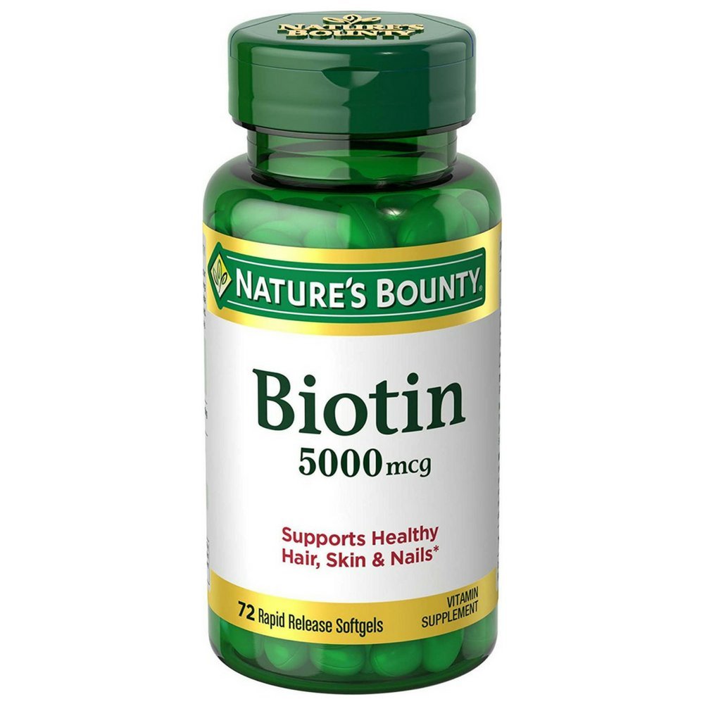 Nature's Bounty Biotin 5000 mcg capsules bottle front supports healthy hair, skin and nails.