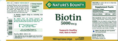 Nature's Bounty Biotin 5000 mcg softgel close-up for convenient daily dose.