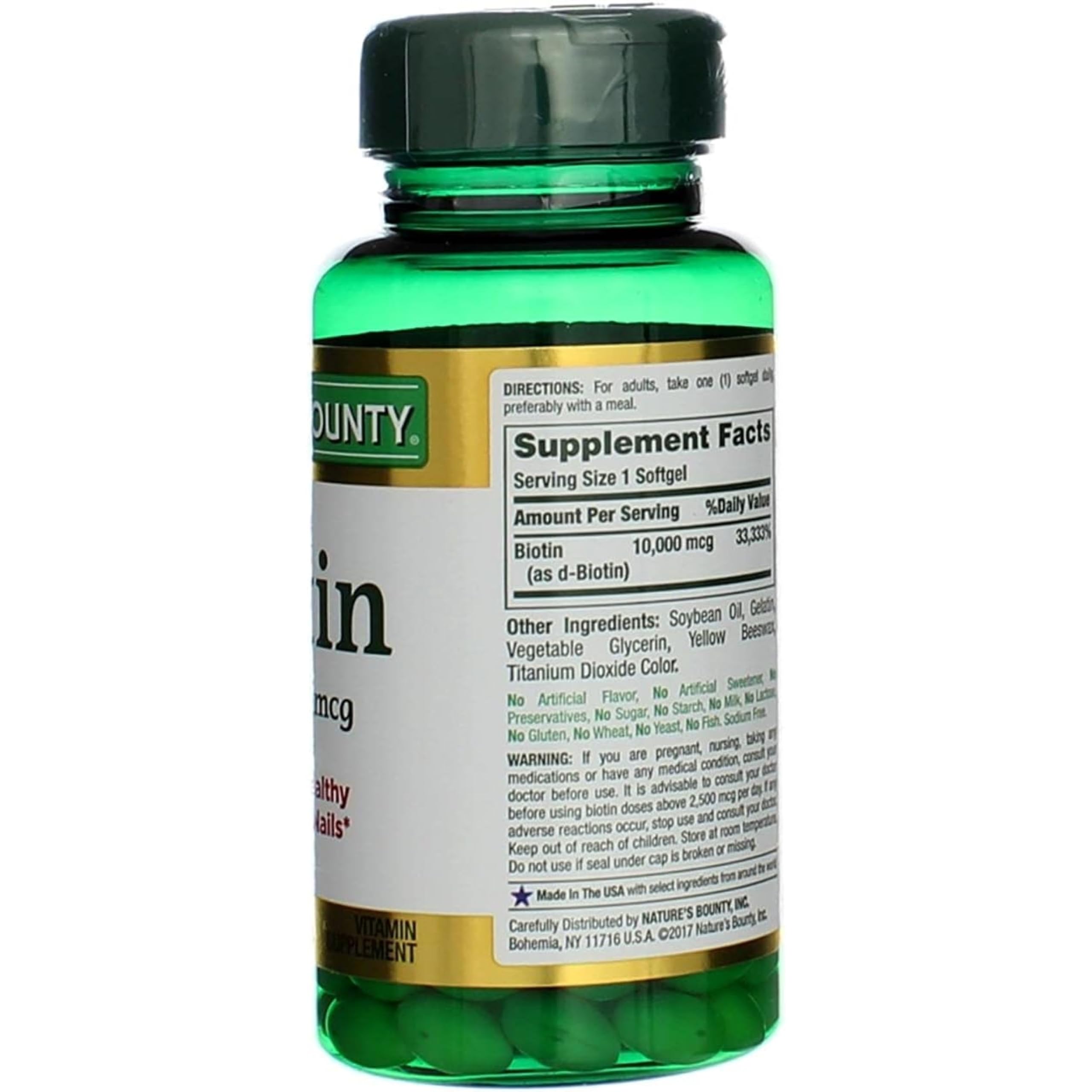 Softgel swallowing action shot featuring Nature's Bounty Biotin.