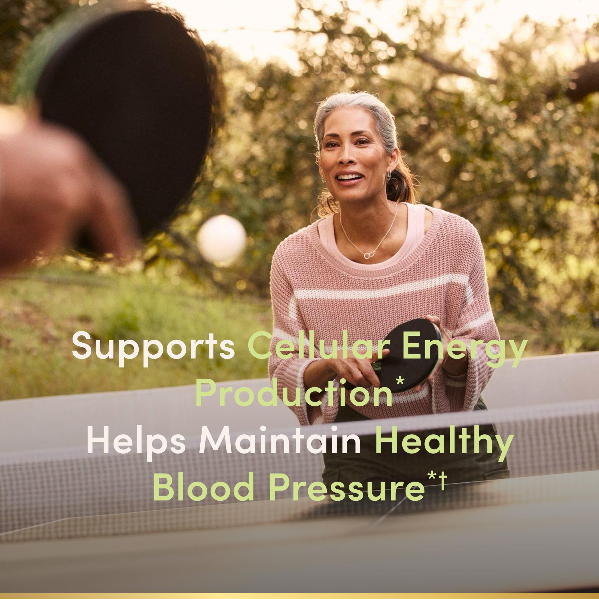 Closeup of Nature's Bounty CoQ10 softgels showing easy-to-swallow capsules.