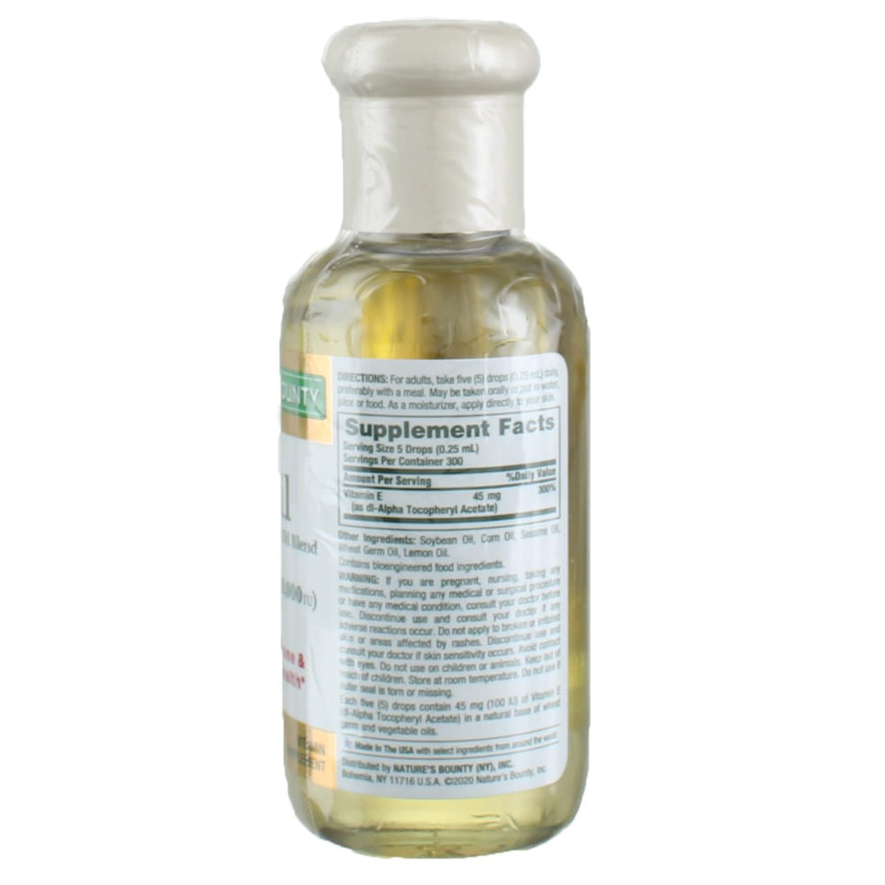 Dropper dispensing vitamin E oil for oral or topical use.