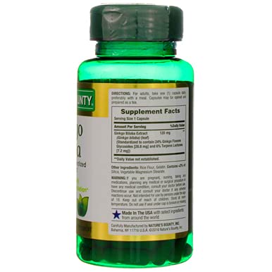 Pouring Nature's Bounty Ginkgo Biloba capsules from bottle for easy dosing