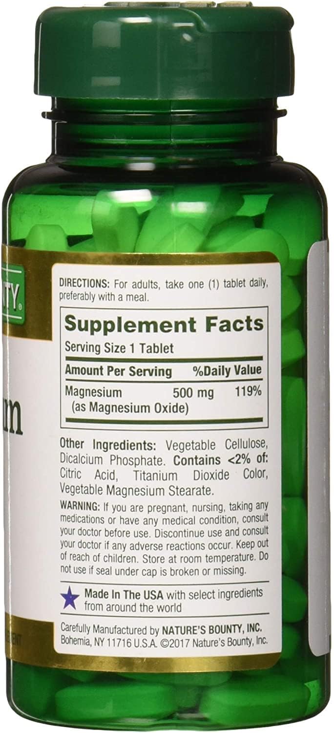 Nature's Bounty magnesium bottle label close-up, non-GMO and vegetarian-friendly notes.