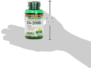 Nature's Bounty Vitamin D3 softgels on kitchen counter with water for quick use.