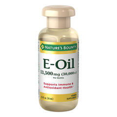 Nature’s Bounty Vitamin E Oil bottle highlighting 30,000 IU for skin moisture.