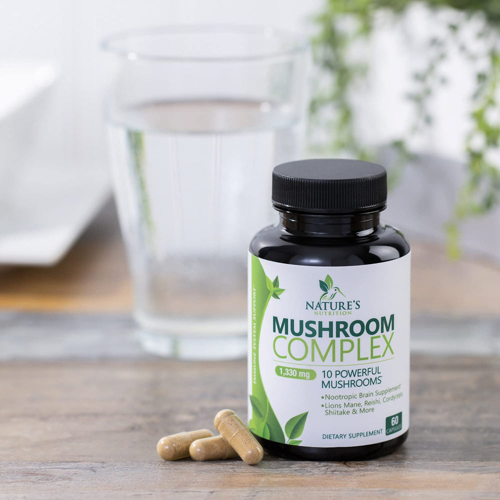 Nature's Nutrition capsule close-up showing powder texture and size.