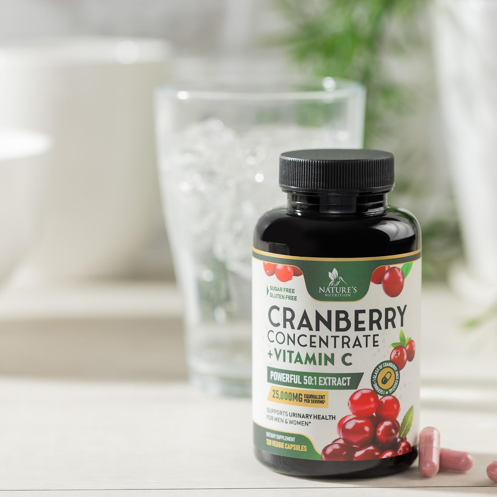 Nature's Nutrition cranberry pills on daily-use scene with water and routine