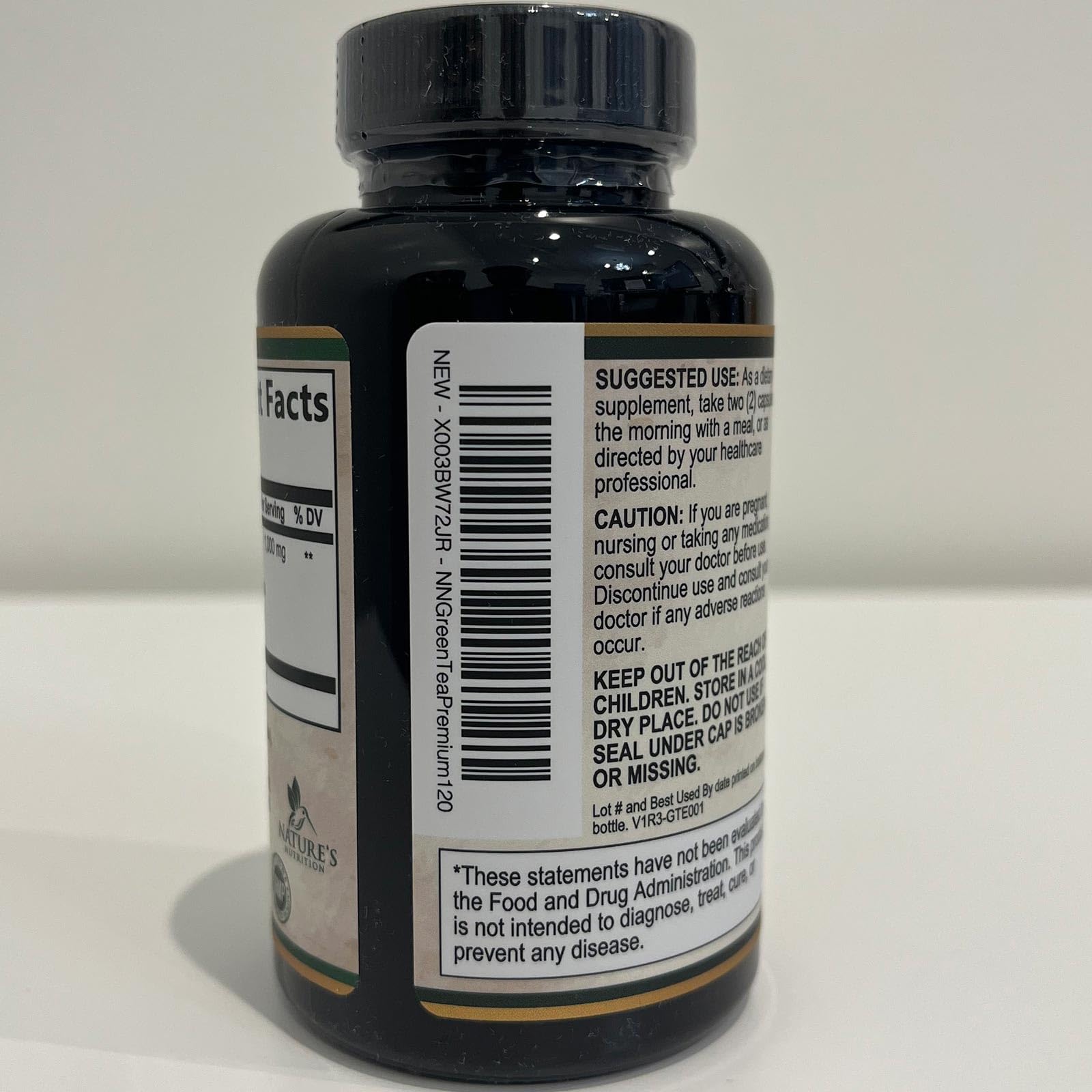 Nature's Nutrition Green Tea Extract bottle with polyphenols graphic highlighting antioxidants
