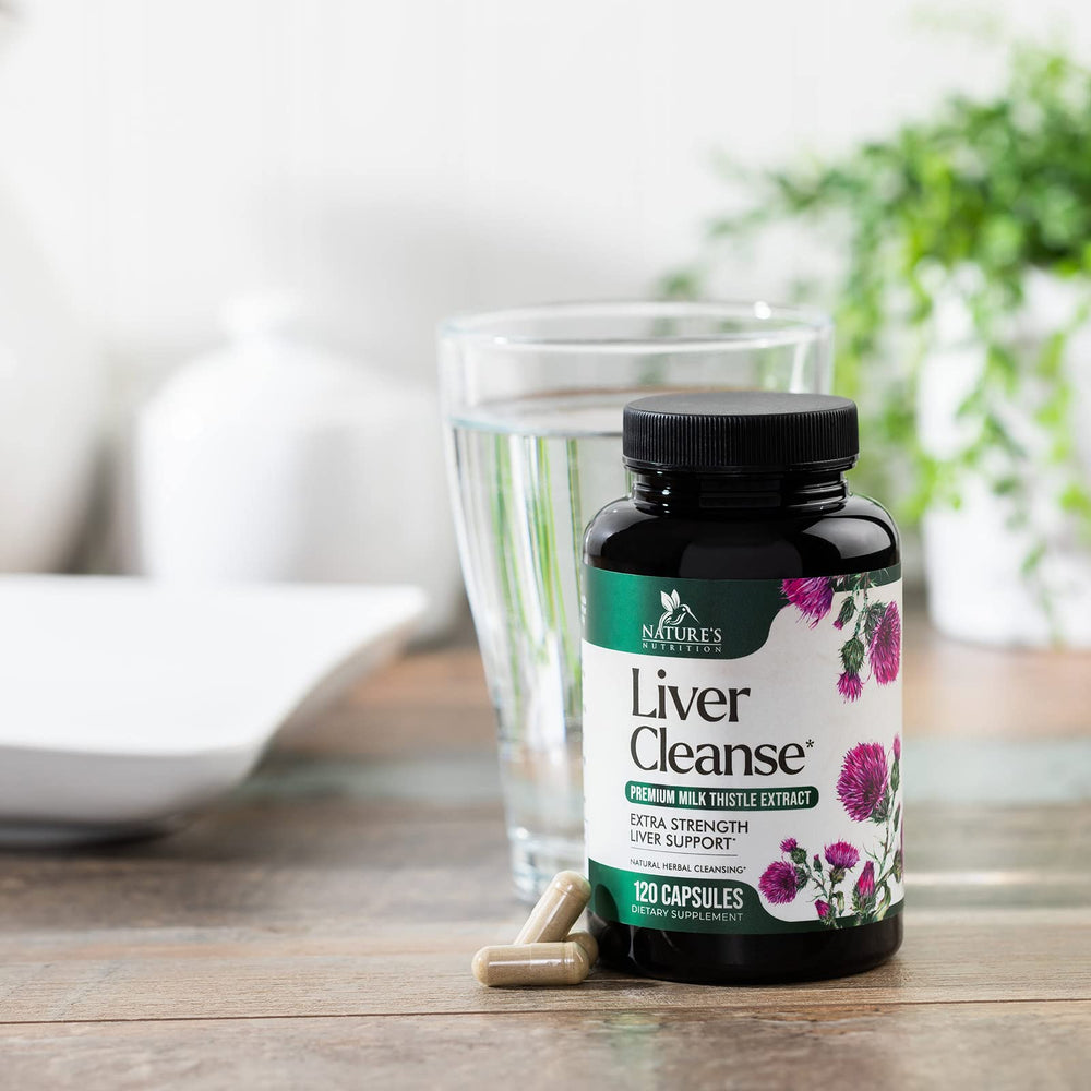 Capsules spill shot of Nature's Nutrition Liver Cleanse emphasizing portability