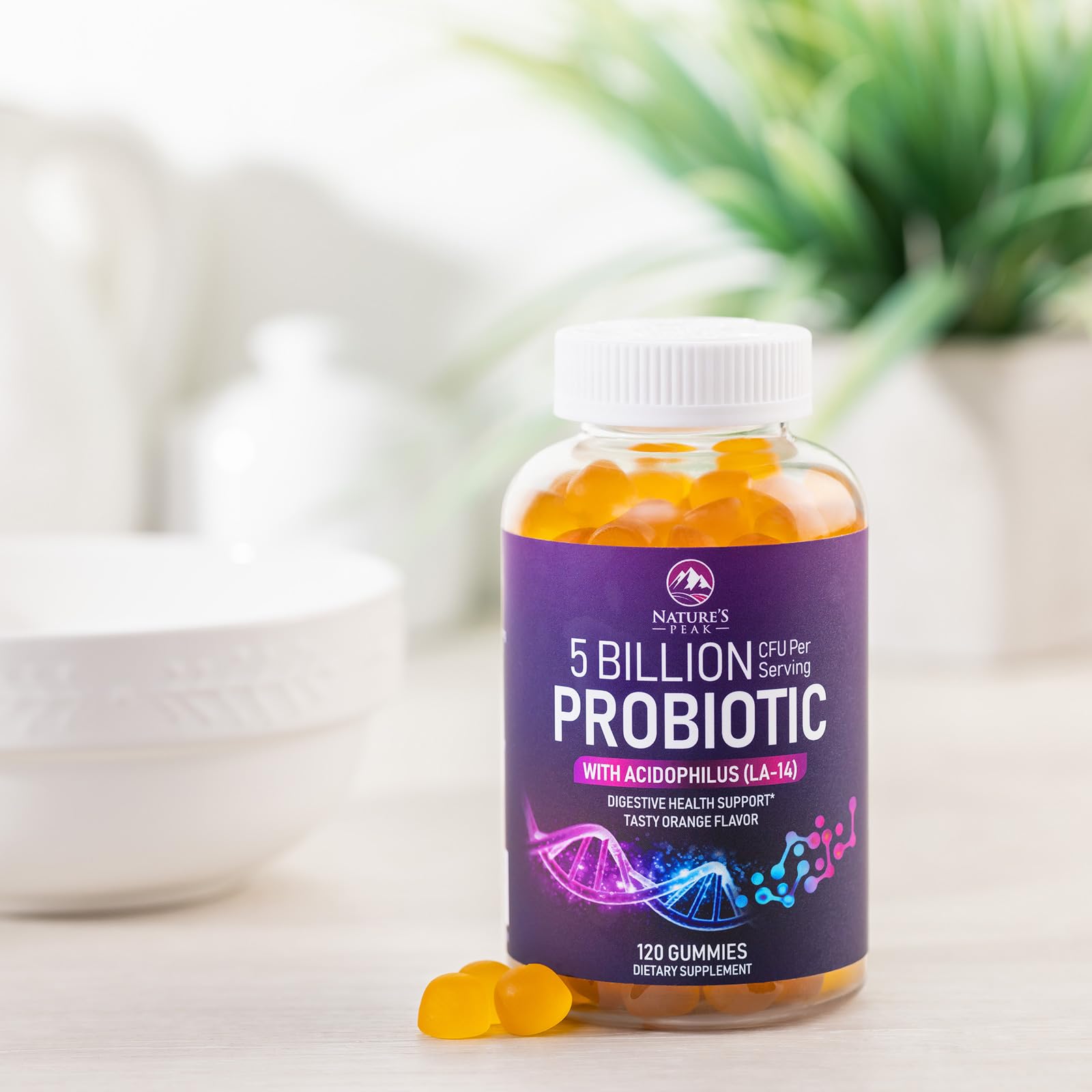 Nature's Peak Probiotic Gummies bottle with gummies ready for daily dose.