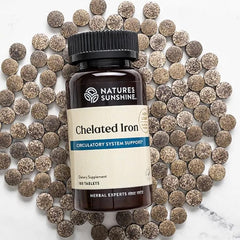 Nature's Sunshine Iron-Chelated 25mg label highlights iron content and vitamin C for absorption.