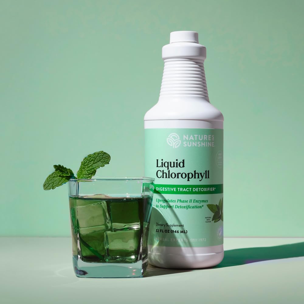 Nature's Sunshine Liquid Chlorophyll drops being poured, spearmint aroma for refreshing flavor.