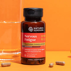 Nature's Sunshine Nervous Fatigue TCM Concentrate capsules ready for daily use.