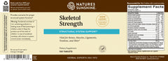 Nature's Sunshine Skeletal Strength bottle with label communicates iron and manganese support.