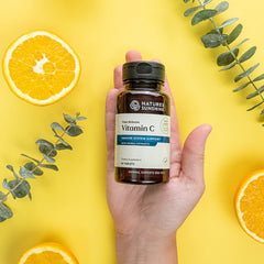 Nature's Sunshine Vitamin C Time Release tablets close-up showing 1000 mg dose