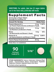 Nature's Truth B Complex tablets close-up shows vegan, non-GMO formula.