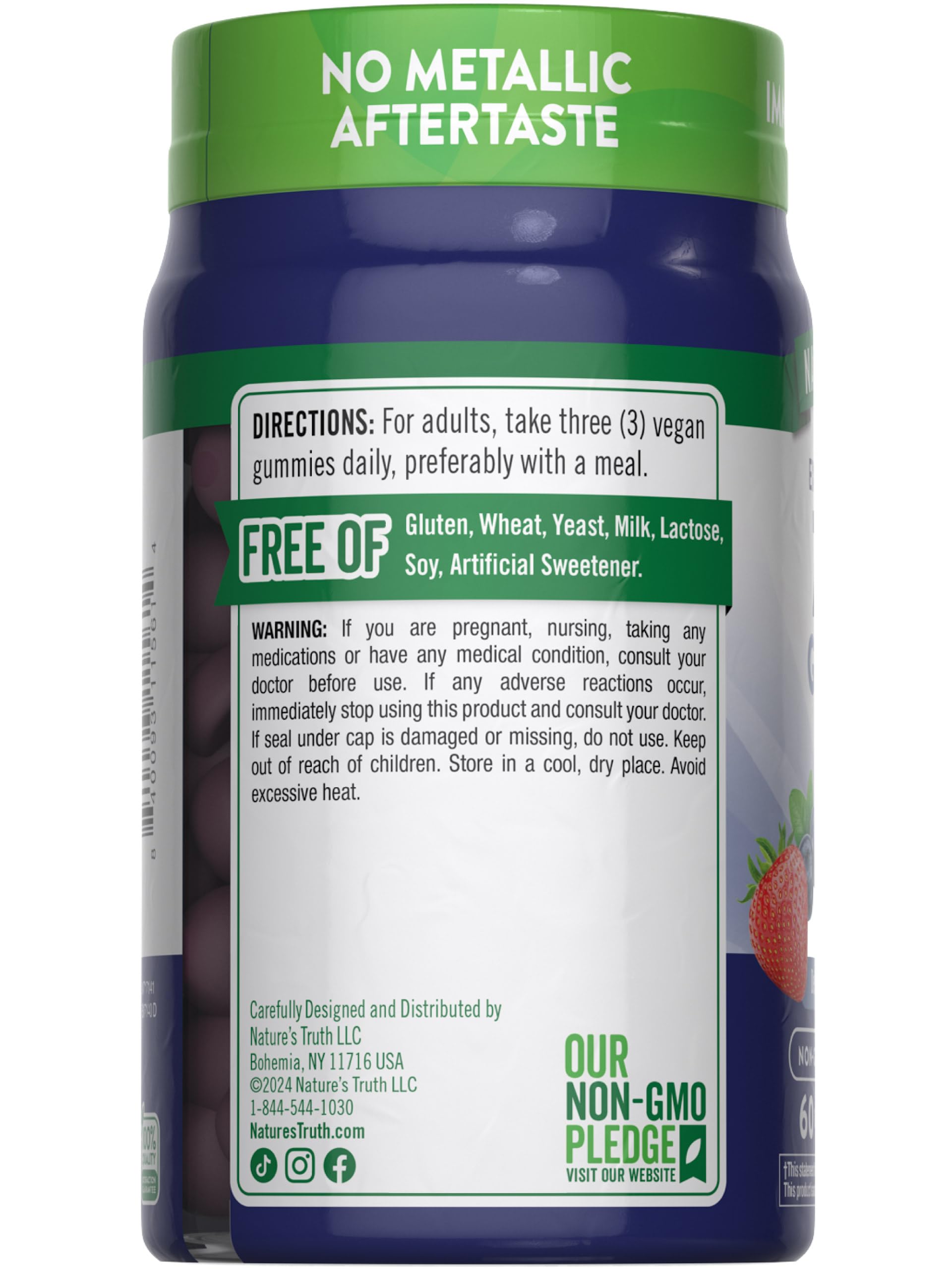 Water glass beside Nature's Truth Zinc Gummies for quick daily intake.