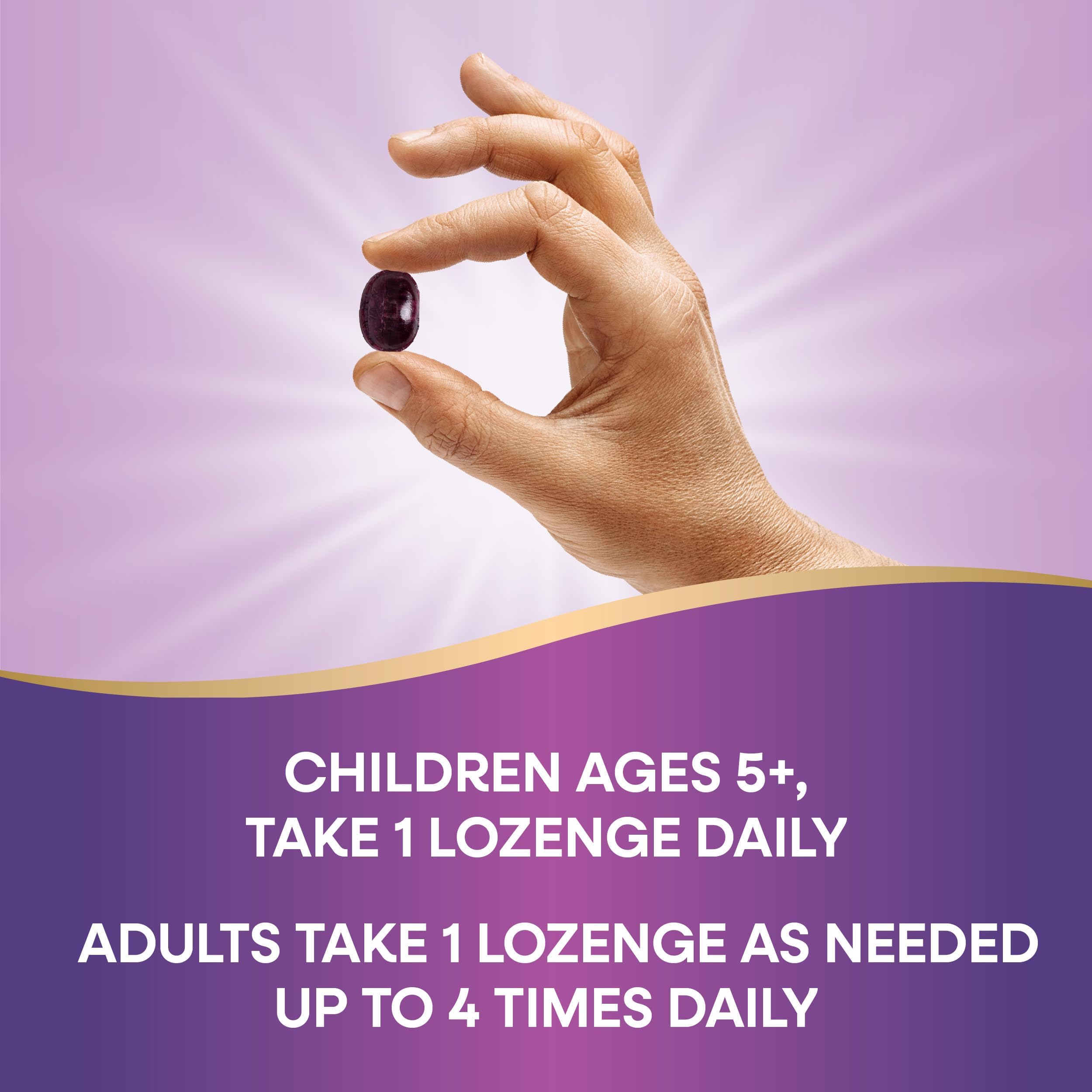 Nature's Way Sambucus lozenges being held for quick use.